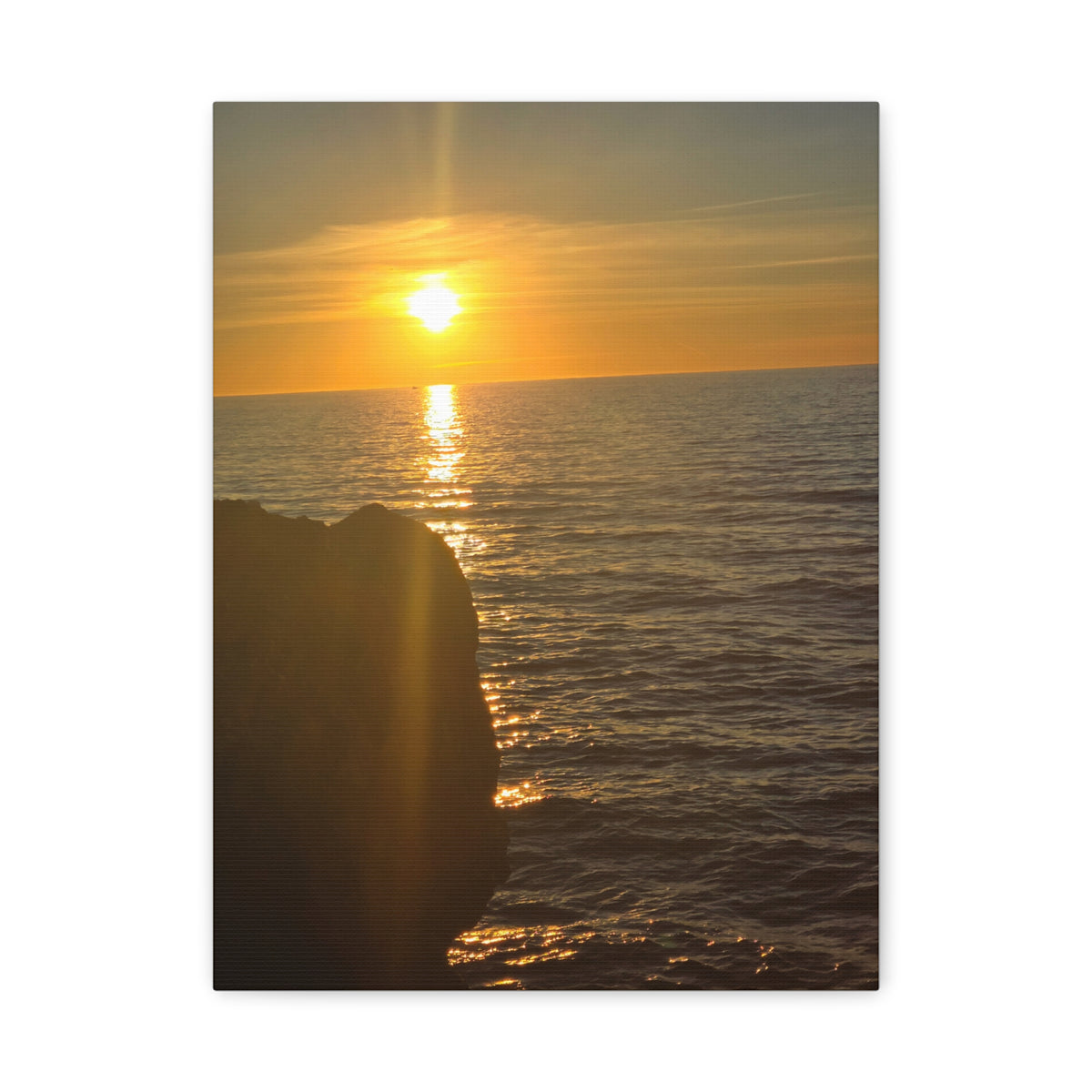Break Wall Ocean View canvas print — warm sunset over open ocean beside a stone breakwall, premium coastal art