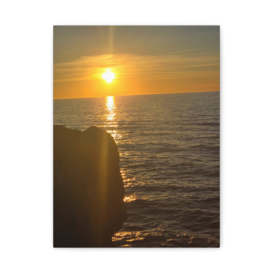 Break Wall Ocean View canvas print — warm sunset over open ocean beside a stone breakwall, premium coastal art