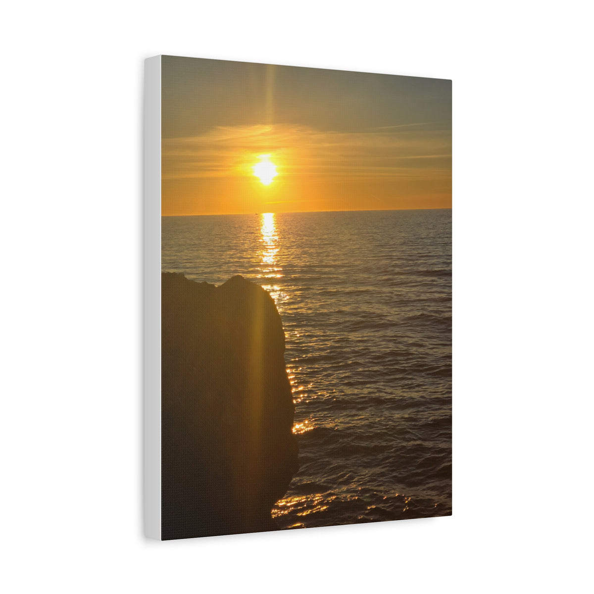 Break Wall Ocean View canvas print — ocean sunset with breakwall, shown in a contemporary home setting